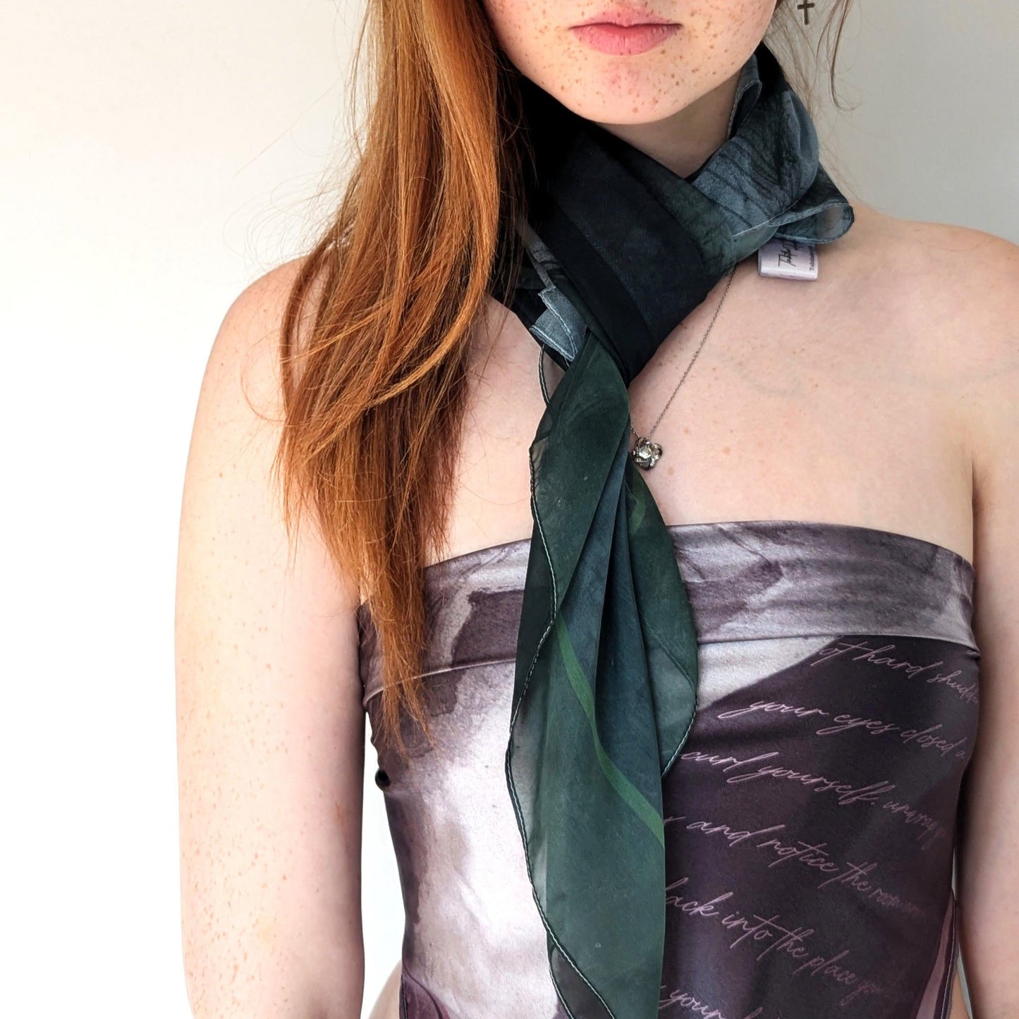 Model wears a Scandalous scarf in pink 'The Trick Is' as a wrap kerchief top and a green 'watch me' scarf - beautiful combination
